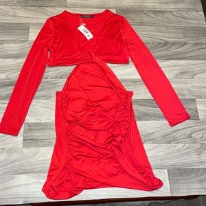 -CBR -size medium - red dress -slits under the breasts -open mid-back
